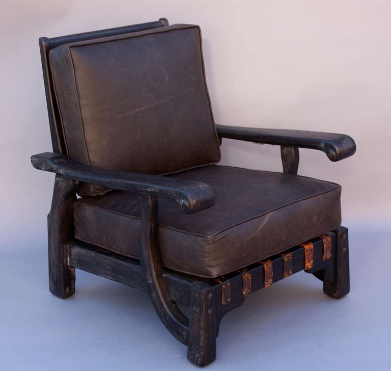 Circa 1930's armchair made by Barker Bros. As pictured with cushions.