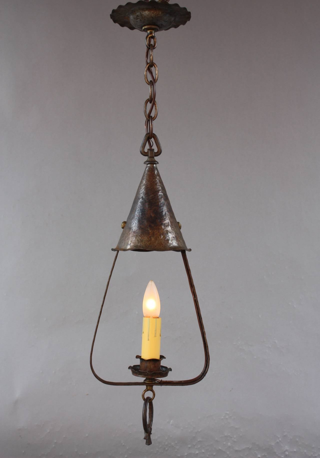 Charming cottage style pendant would fit well in Spanish Revival, Colonial and English Tudor home. Body of fixture is 22