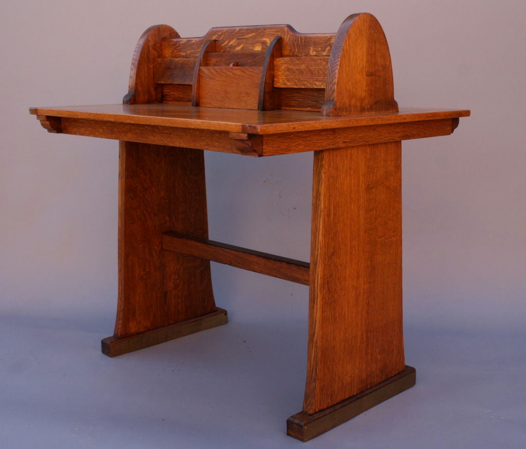 Uniquely designed two-sided letter desk.  It features a simple, graphic design that can be mixed with Modern or with classic Arts & Crafts furnishings.