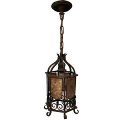 Finely Detailed Wrought Iron and Mica Lantern