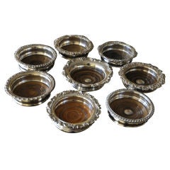 A Choice of Eight silver-plated 
Old Sheffield Wine Coasters