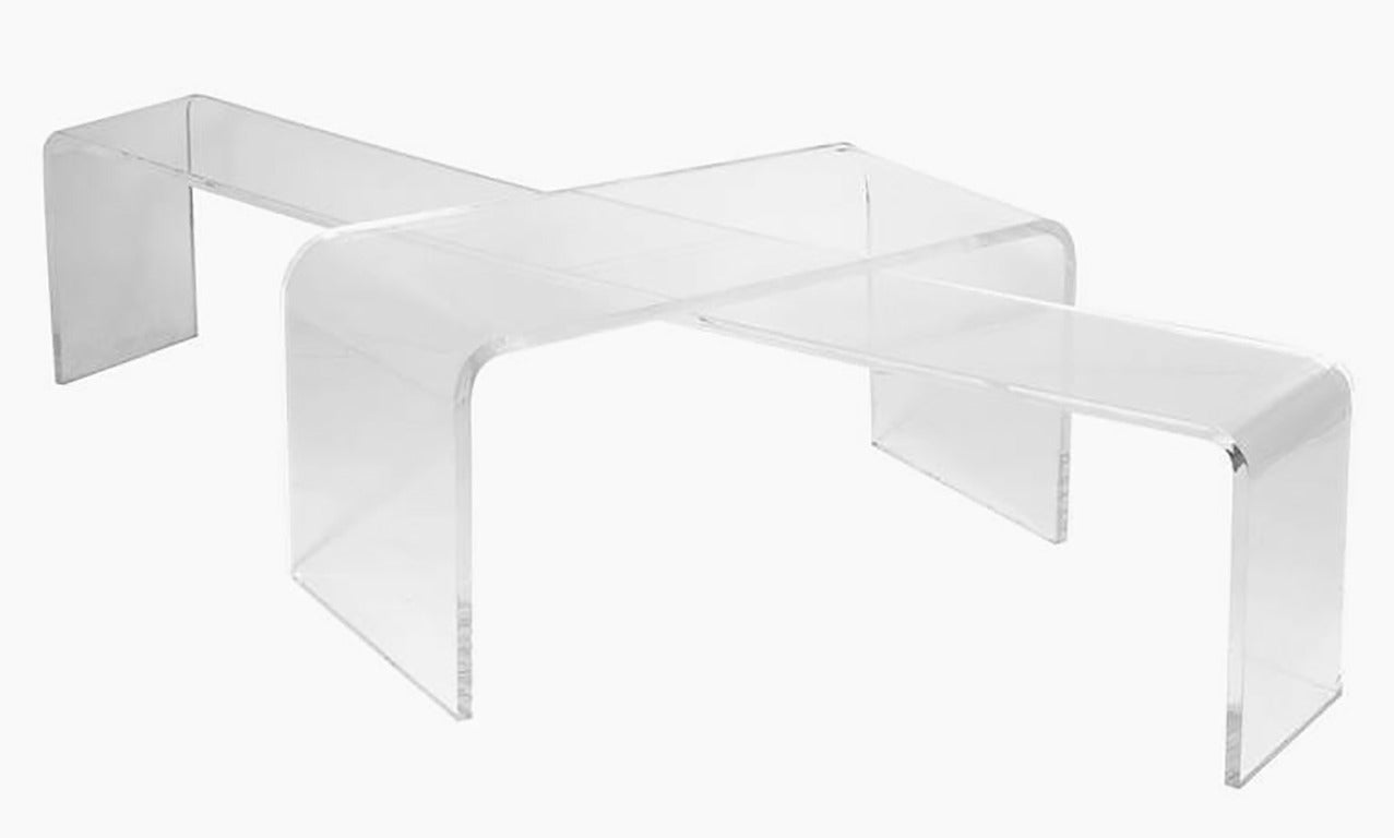 Clean lined Lucite coffee or display tables, American, circa 1970s. 
The longer table measures: 14