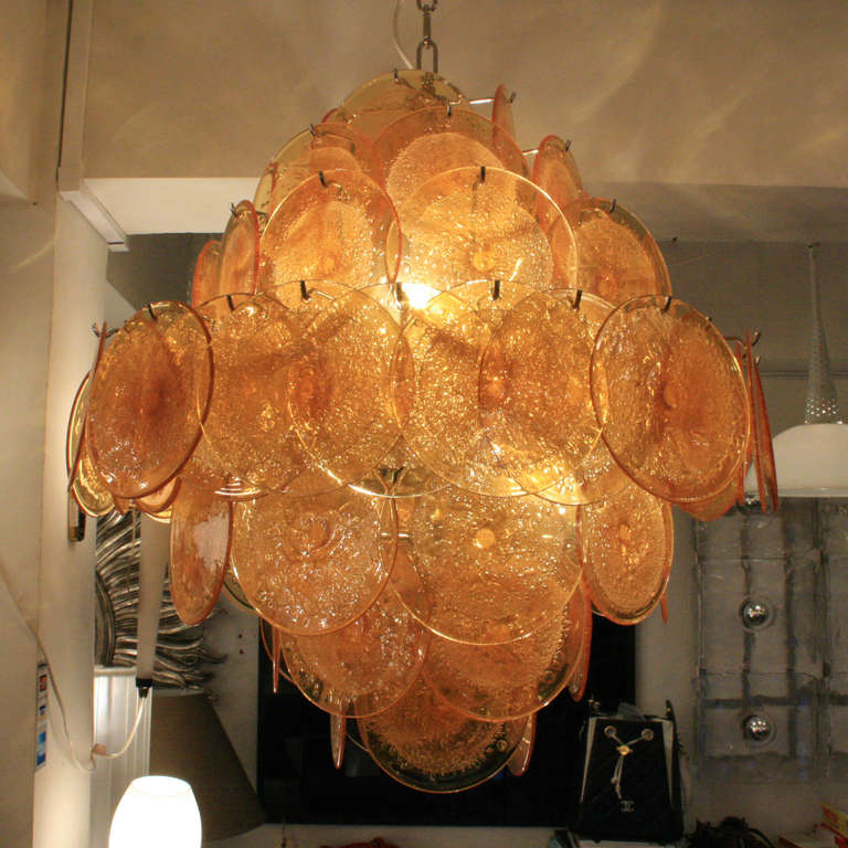 Amber colour blown glass discs, on chrome steel structure. Made in Italy