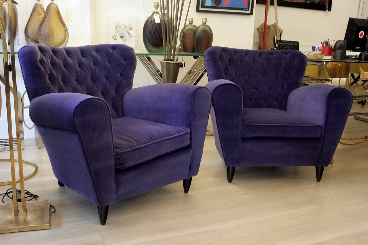 A pair of large armchairs, violet velvet upholstery  in style of  Guglielmo Ulrich  Made in, Italy, circa 1940s.