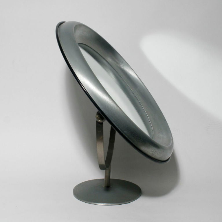 A modernist Italian table top mirror, brushed steel structure.