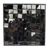 A large black  sculptural panel  " PROTOTIPO X"