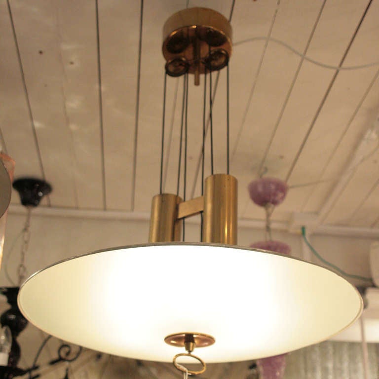 Height adjustable ceiling light, glass shade on metal structure with brass details by Max Ingrand for Fontana Arte ca.1950s