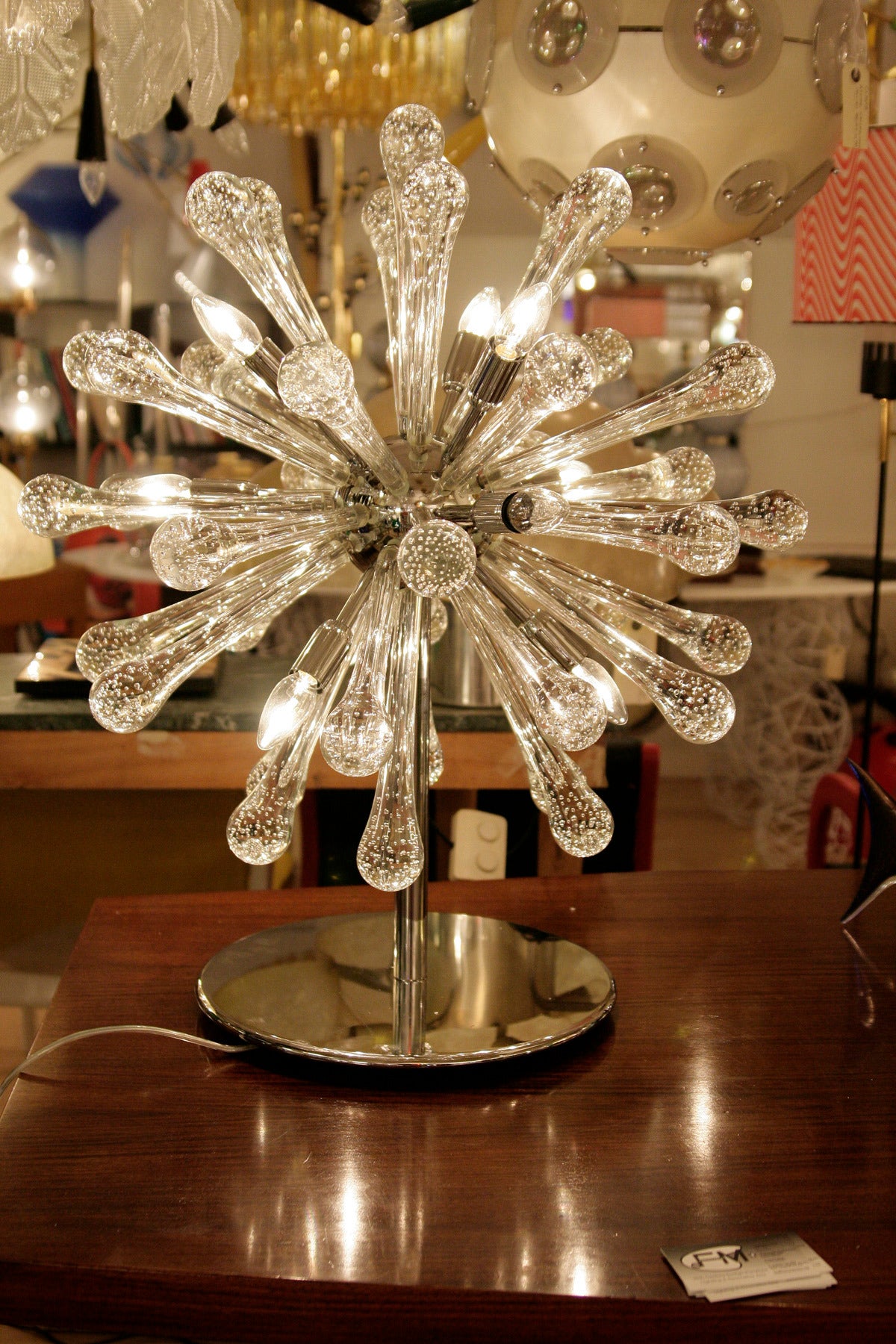 handblown glass components on chrome steel structure. Made in Italy, Murano
ten lights
40 Watts max.