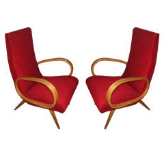 A stunning pair of modern british design midcentury armchairs.