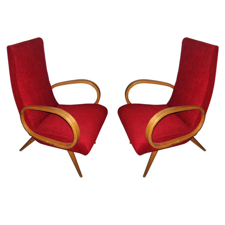 A stunning pair of modern british design midcentury armchairs. For Sale