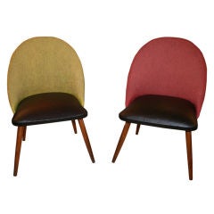 A pair of 1950s round back chairs