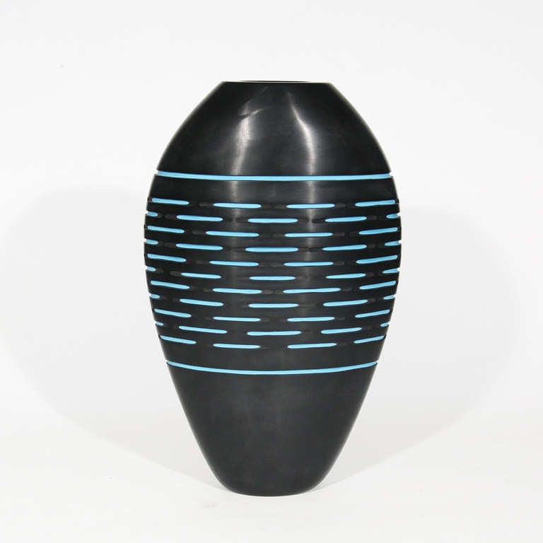 A unique art vase, blown glass incased turquoise and black outside, Battuto technique by Cenedese