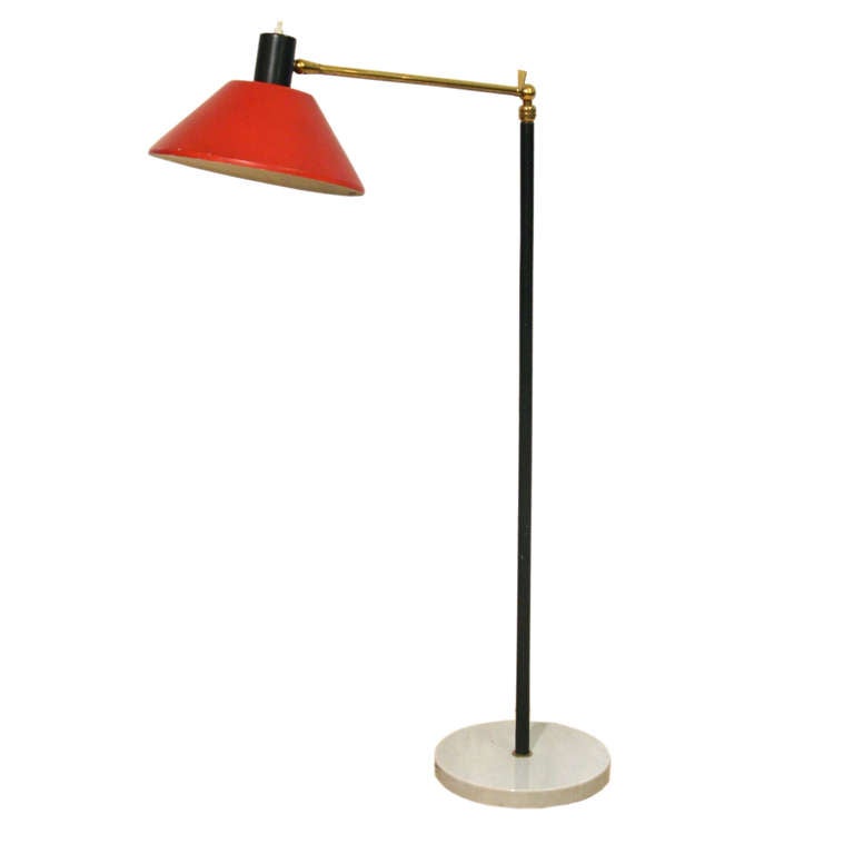 Red enameled  articulating shade, adjustable heights, on a marble base. Made in Italy by Stilux, circa 1960s.