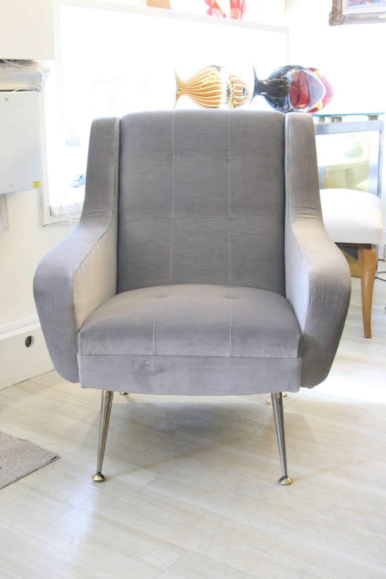 A pair of 1950s armchairs, grey velvet upholstery on metal feet. Design by Carlo de Carli Made in Italy.