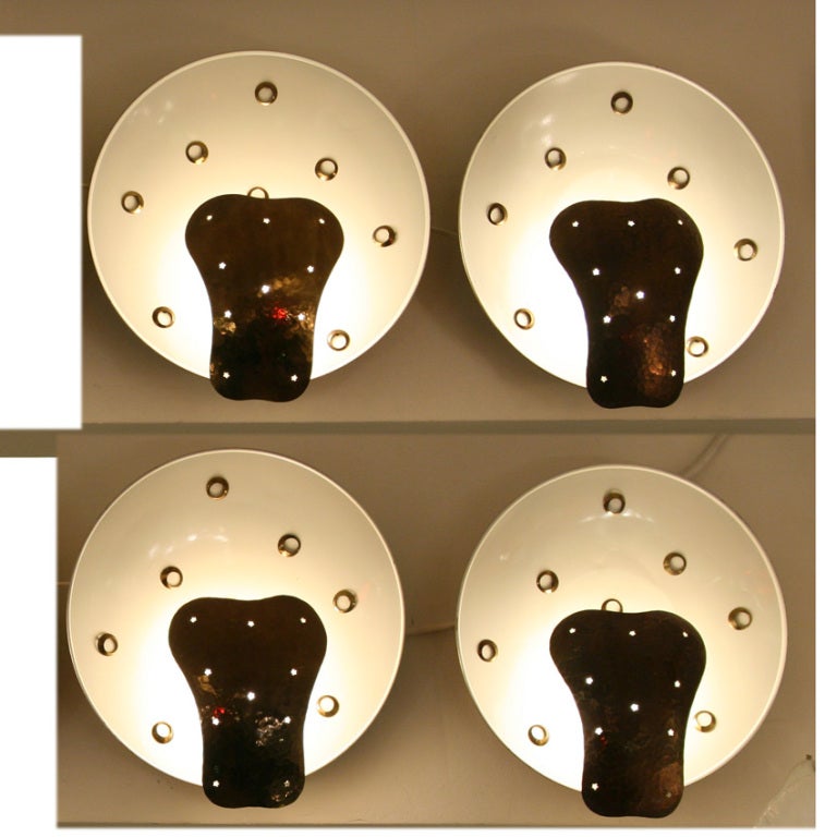A set of four wall lights
