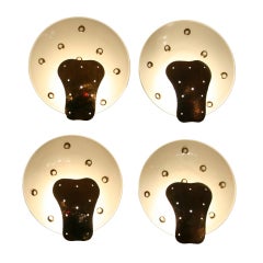 A set of four wall lights