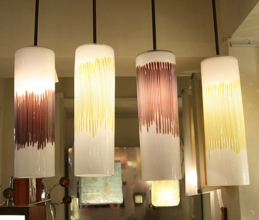 A Set Of Four Massimo Vignelli Suspension Lights