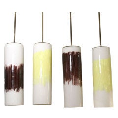 A Set Of Four Massimo Vignelli Suspension Lights