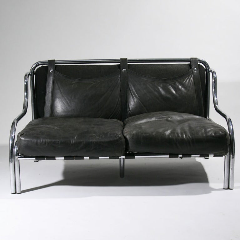 A two sitter black leather sofa designed by Gae Aulenti for Poltronova 1965 Italy