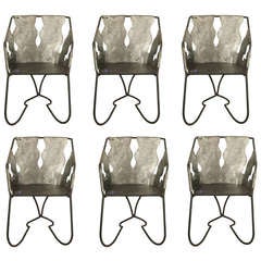 A Set of 6 Wrought Iron Chairs