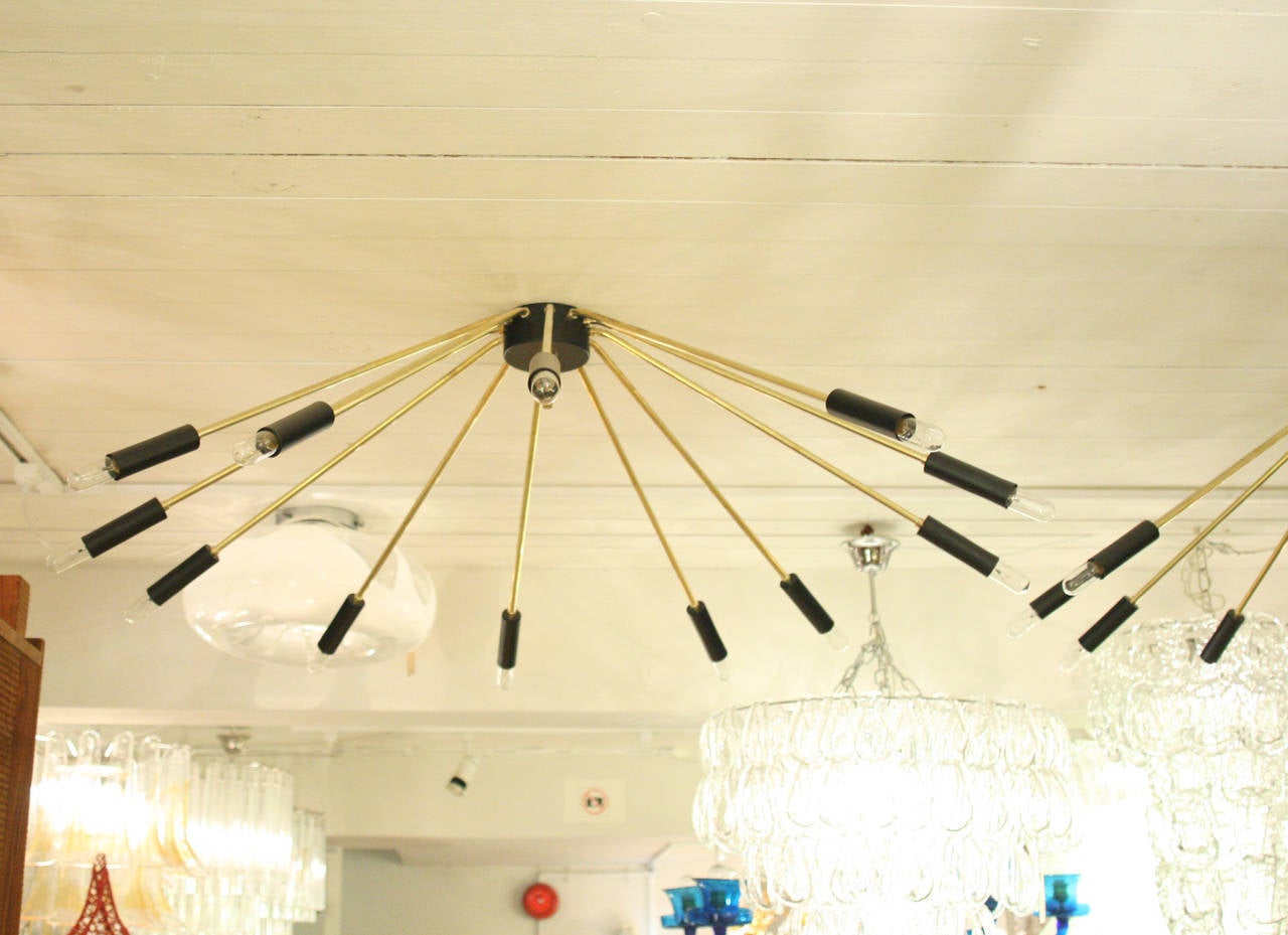 Sputnik ceiling lights, brass structure with black enameled details. Made in Italy,