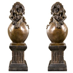 Pair of Bronze Lions on Pedestals 