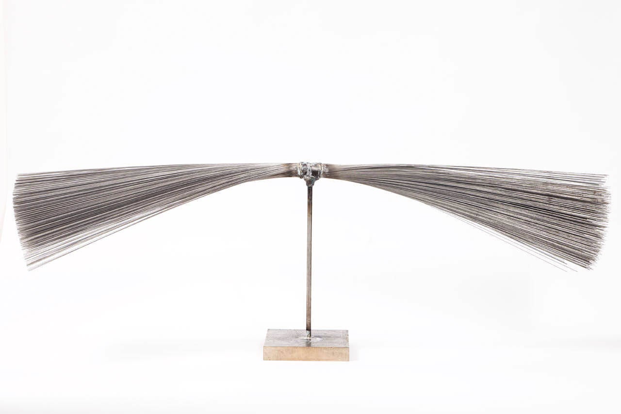 Contemporary artist Val Bertoia's Relaxing Spray Sculpture made in 2014. This kinetic sculpture is made of two groupings of stainless-steel wires that were made by Harry Bertoia (circa 1950s-1960s). The wires were silver-melted together at the ends