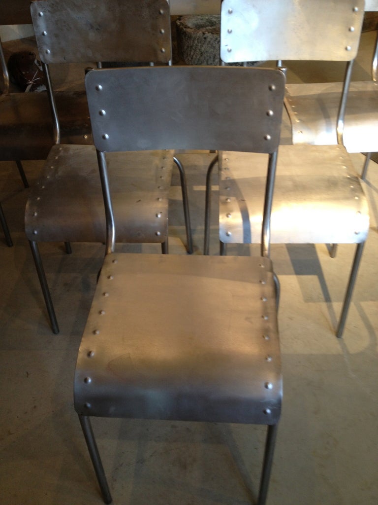 Set of Ten Riveted and Polished French Steel Chairs at 1stdibs