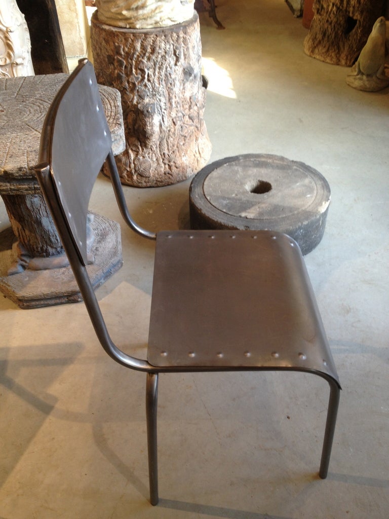 Set of Ten Riveted and Polished French Steel Chairs at 1stdibs