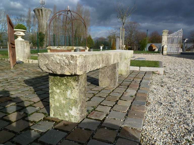 Simple, elegant, and very streamlined...this long hand-carved limestone bench in 5 parts is the perfect addition to your classic or contemporary garden.  Beautiful weathered surface and lovely condition.  