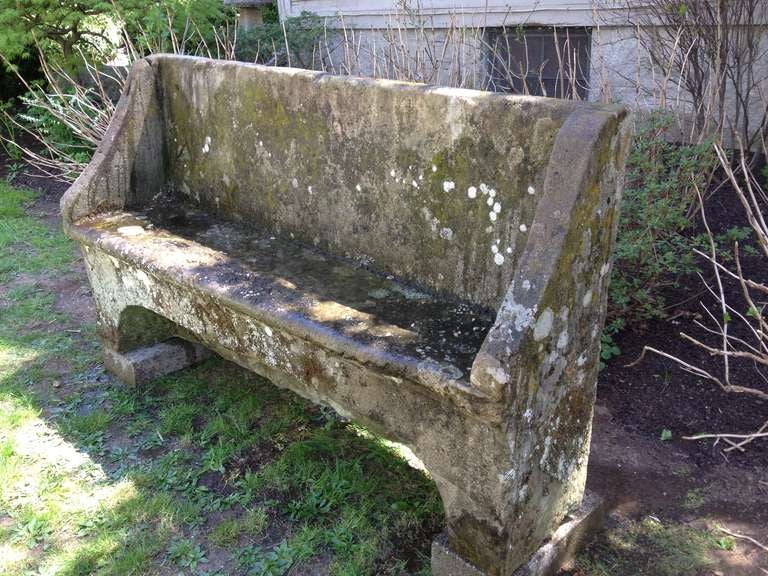 Certainly, this is the best piece we have bought in the past year!  Hailing from eastern France and hand-carved from a single piece of very hard limestone, this hi-backed garden seat is truly spectacular.  Featuring an incredible patina with