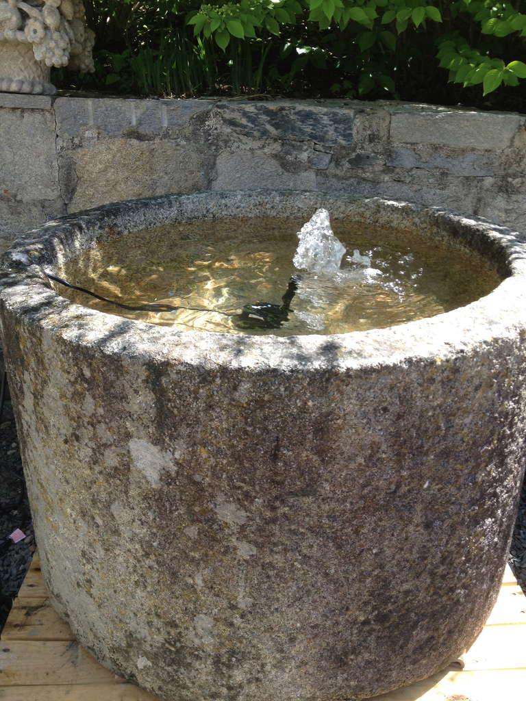 This piece is flat-out amazing and rare, rare, rare.  Carved from a single piece of granite and dating to the late 18th C, this beautifully-weathered vessel is in superb condition and, as you can see from the photos, makes a wonderful fountain. 