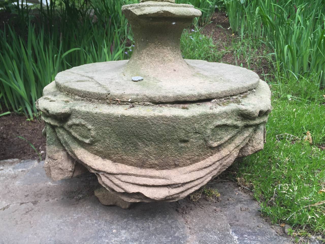 We discovered this large pair of carved stone urn top finials in the far northern reaches of England. Amazing in form and size, their bowed and swagged decoration is subtle and elegant, while their sculptural essence shines. Imagine them raised atop
