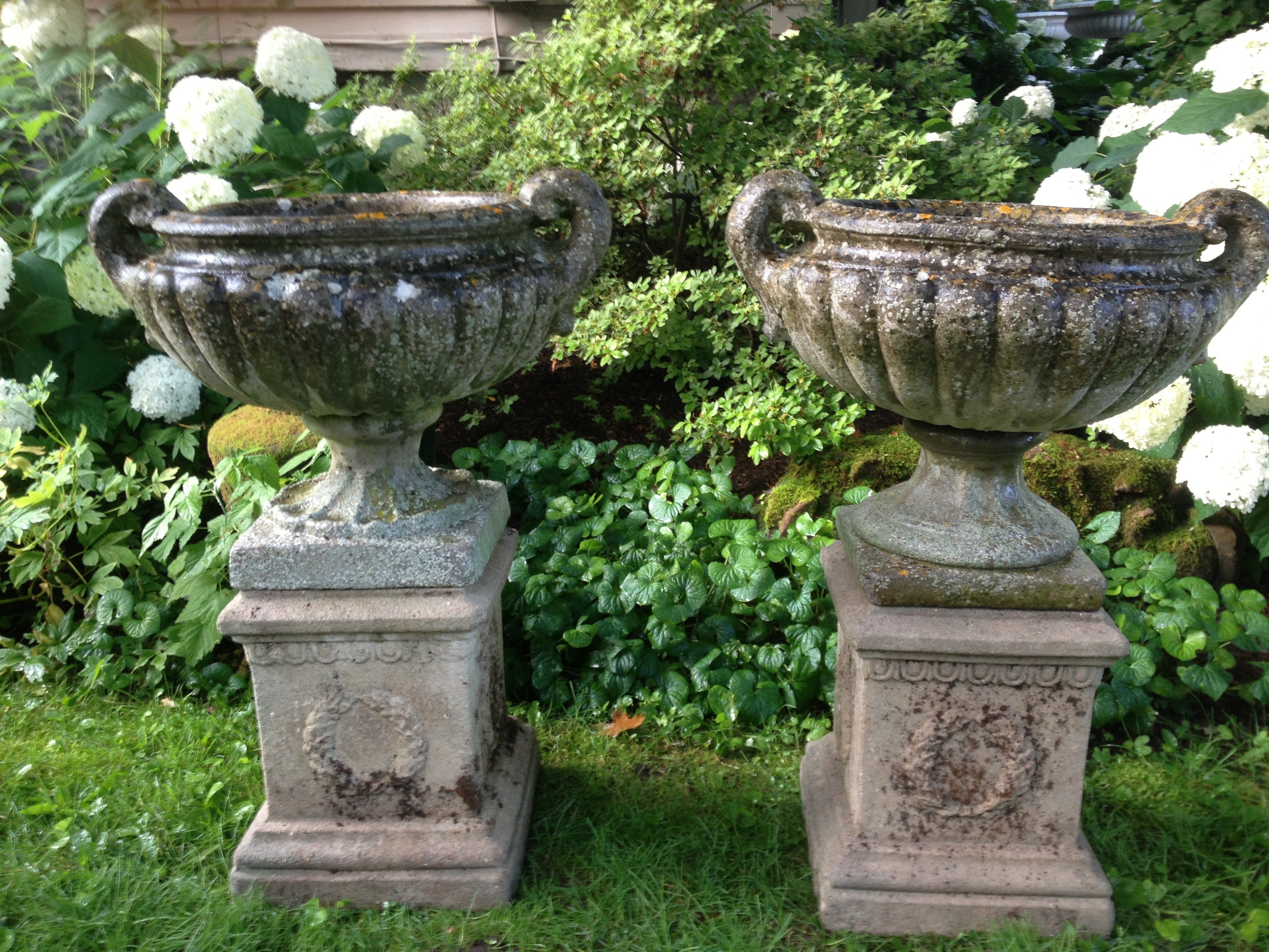 Elegant Near Pair of English Cast Stone Pulham-Style Urns