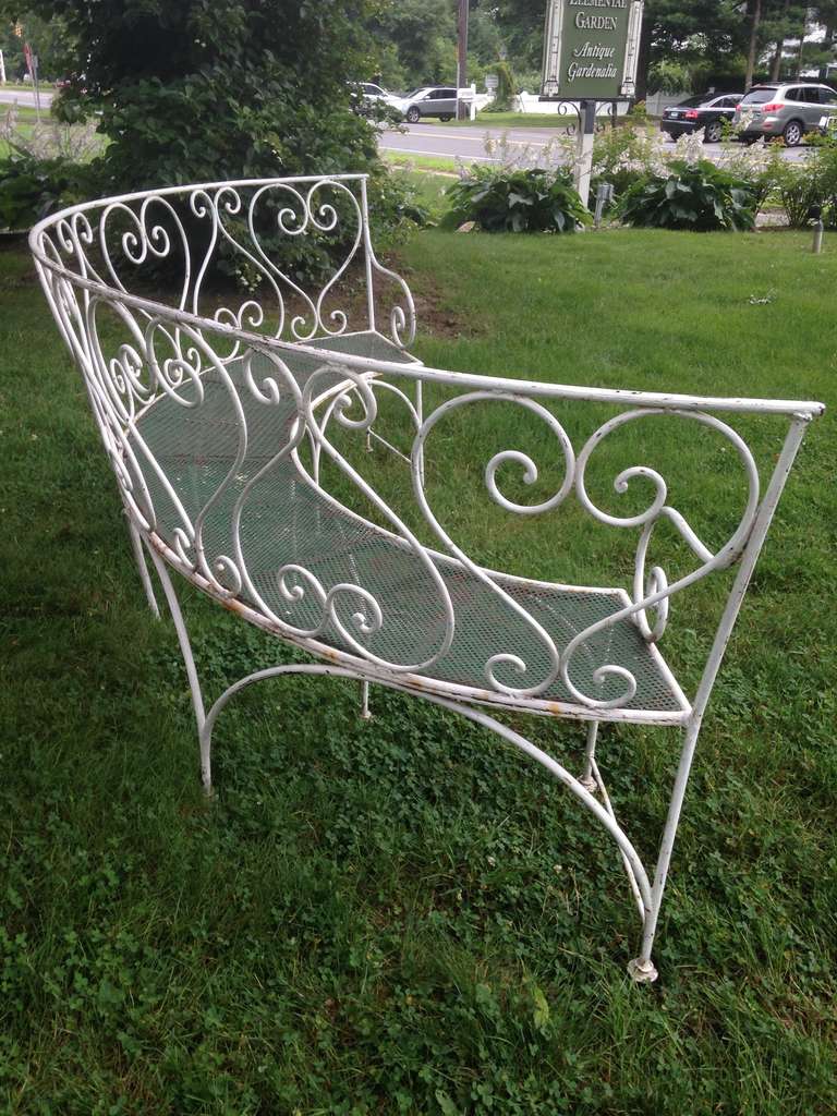 curved wrought iron bench