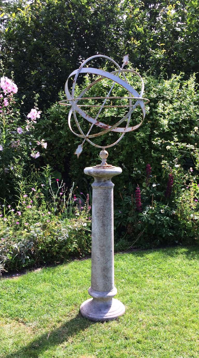 This stunning English armillary will make a fabulous centerpiece for your rose or herb garden.  Tall and stately, the armillary is contemporary, but finished in a weathered pale grey painted surface with bits of rust, so only you will be the wiser. 