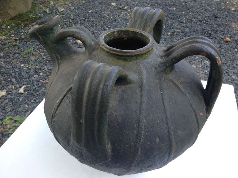 This stunning black-green water pitcher is from the Perigord region of France and dates to the late 18th century. In marvelous condition for its age, it has a few flakes to the glaze and two tiny chips to the spout, but overall is exceptional.