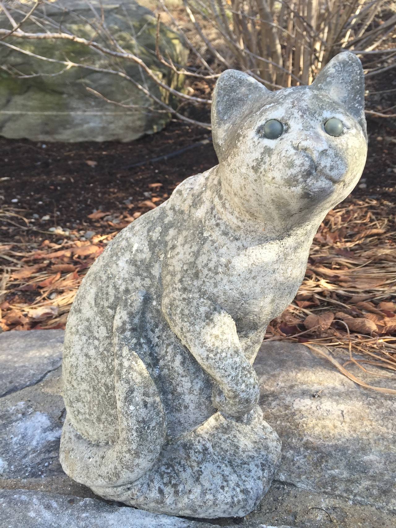 This little guy is just so adorable. With well-weathered glass eyes and a beautiful lichened surface, he is perfect atop a stone wall or standing guard in your garden. Perfect condition!