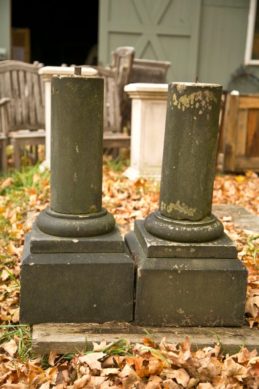 What a great pair of table bases! Classic in form and hand-carved from warm, golden-colored Yorkstone, these bases survived the coal dust-filled Industrial Revolution in northern England, and so, have a blackened surface with early greening. Top