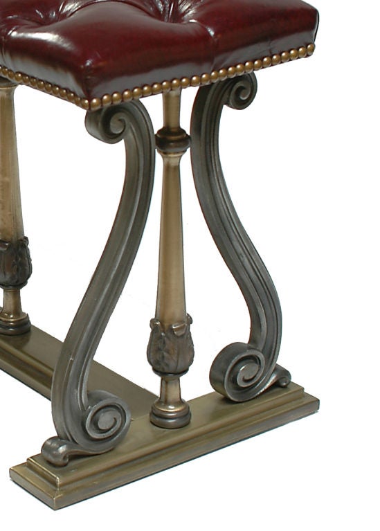 Upholstered leather bench with Brass base