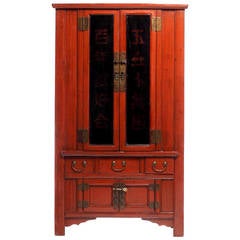 19th Century Red and Black Chinese Armoire with Calligraphy and Brass Hardware