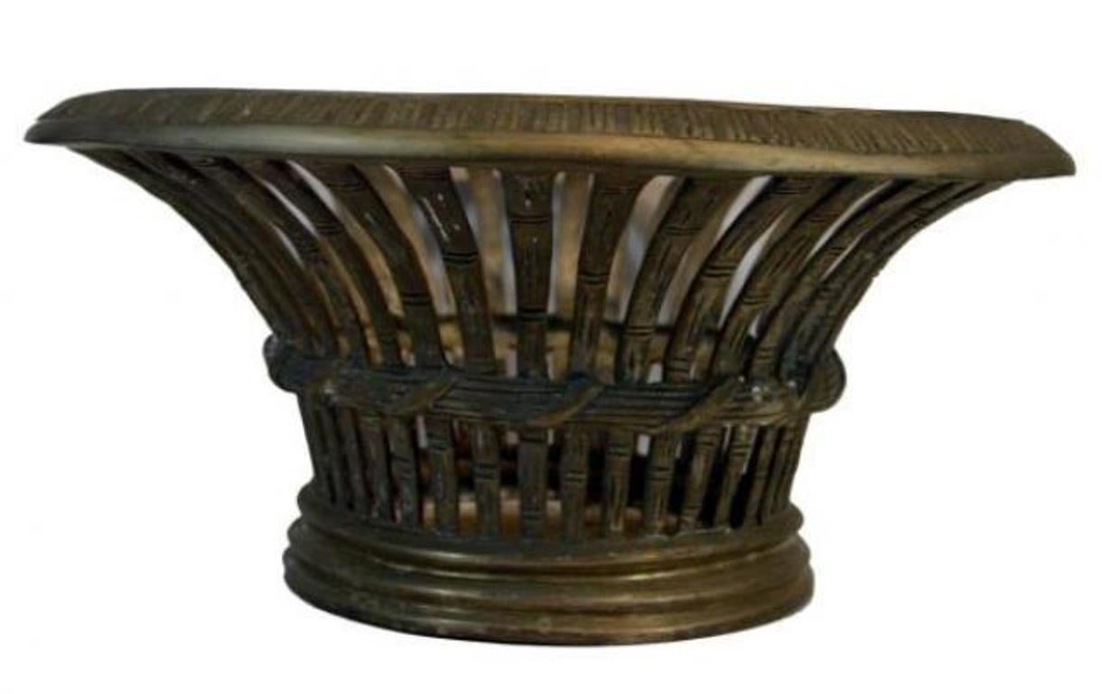 A 20th century Thai openwork Venetian basket made with silver plated bronze. This basket features a wide opening with a large carved edge made of bronze strips with a faux bamboo motif. The basket rests on a base with three rings. The entire piece