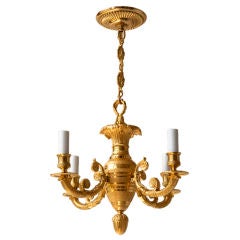 A fine Charles X 4 arm gilt bronze chandelier