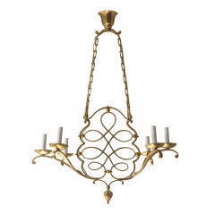 6 arm brass chandelier with  central scrolling ribbon decoration