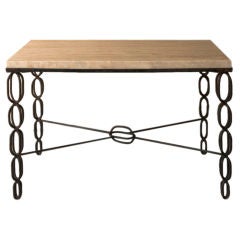Small wrought iron and sealed travertine coffee table