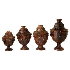 A group of glazed terracotta room warmers -sold singly