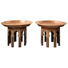 Pair of octagonal Orientaliste tables with round brass tray tops