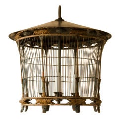 Round oriental style paper and wood bird cage chandelier