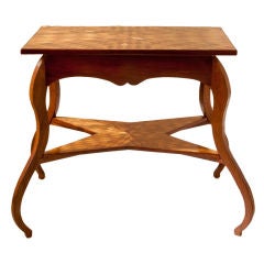 An unusual diamond parquetry top fruitwood table