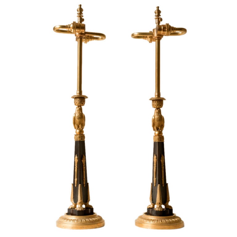 Pair patinated 
gilt bronze candlestick lamps, retour d
Egypte